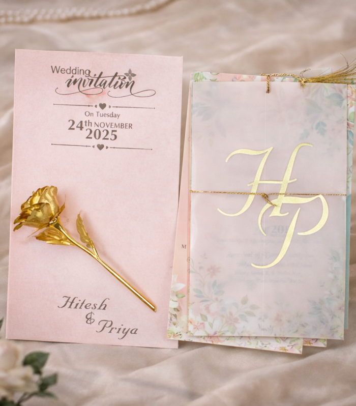 Elegant Blush Vellum Wedding Invitation with Gold Monogram & Soft Translucent Wrap
